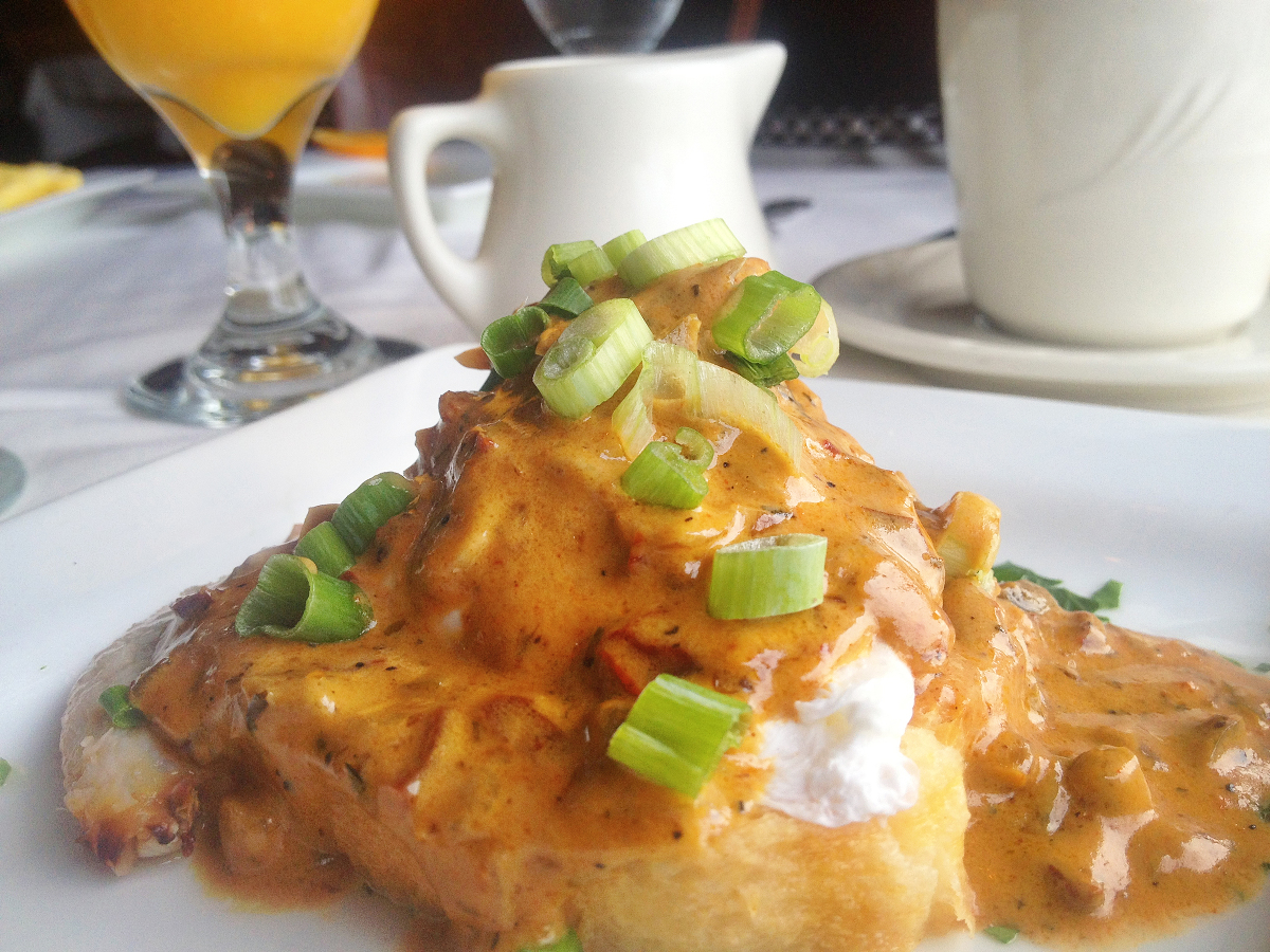 Poached Egg & Crab Over a toasted baguette slice with a New Orleans